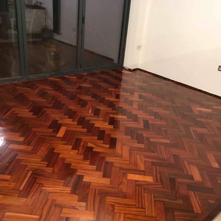Reclaimed mahogany parquet installed - Weatherby